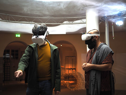 Visitors on the elevator platform with the cloud above them, selecting new levels to lift to. Copyright: Matters of Activity

